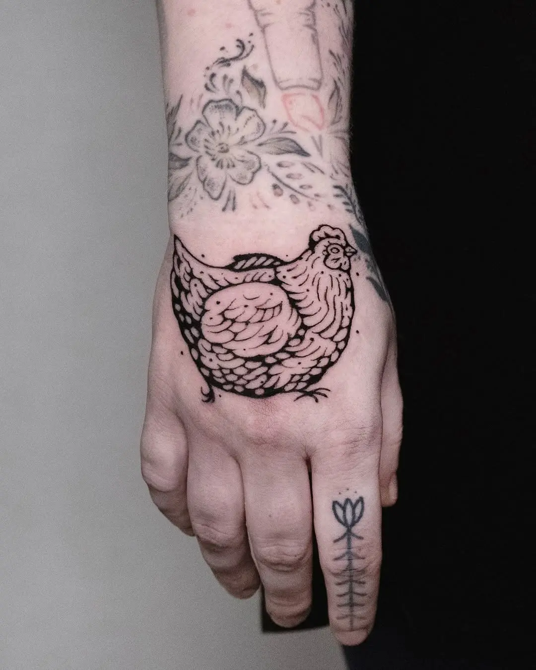 Unique Chicken Tattoo on Hand Reveal