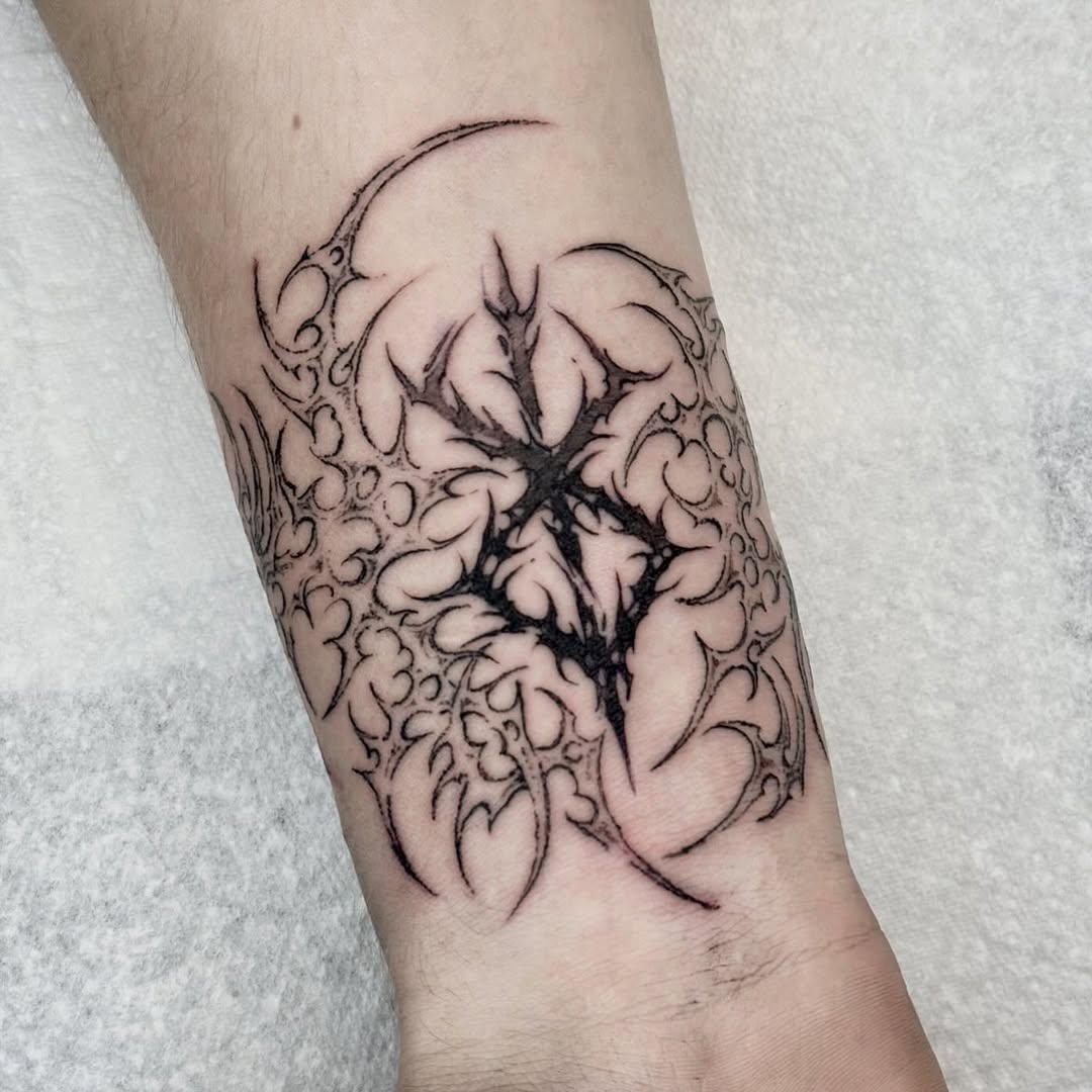 Captivating black ink sacrification tattoo design