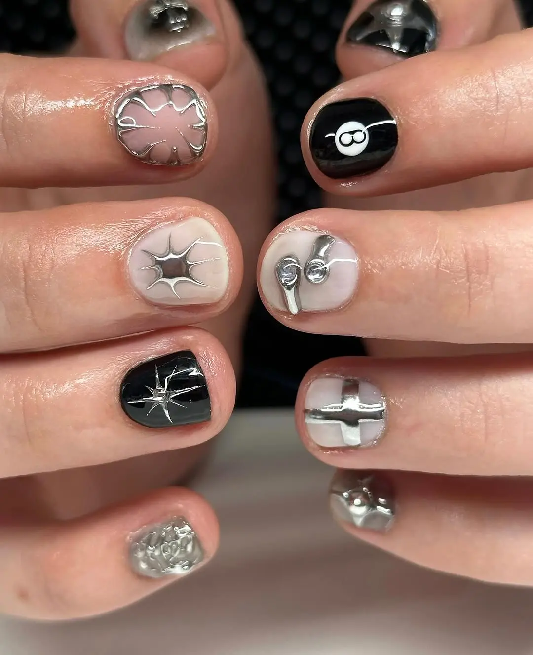 Stylish short winter nails with modern designs