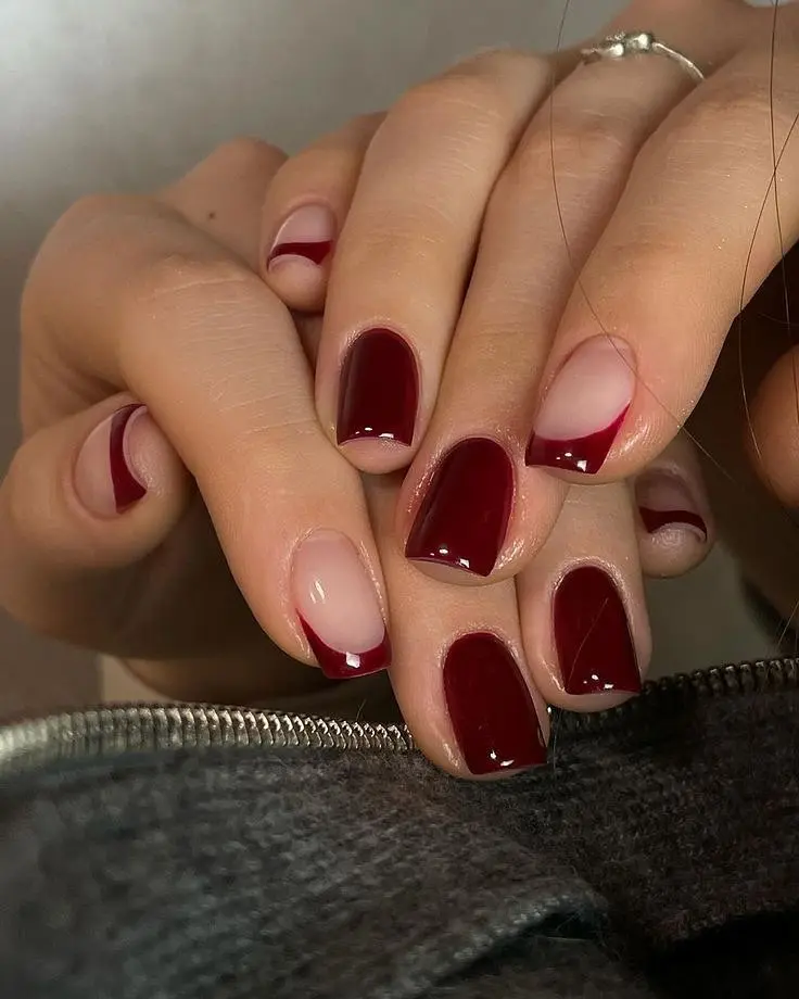 Elegant short nails with deep red accents