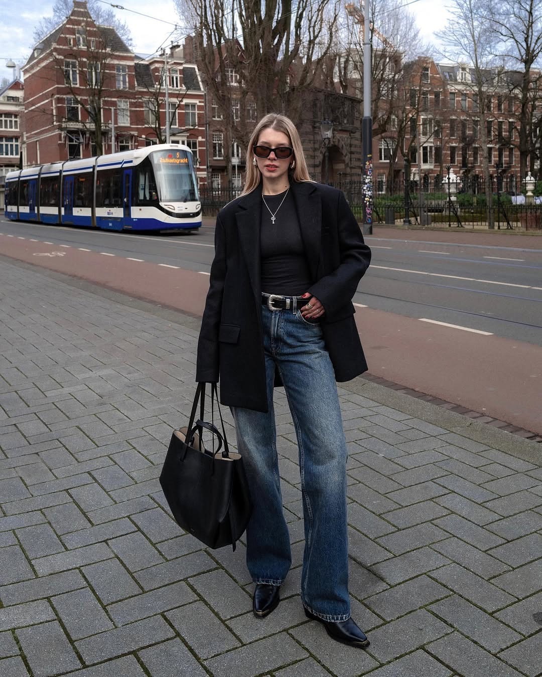 Chic Black Blazer with Casual Denim Ensemble