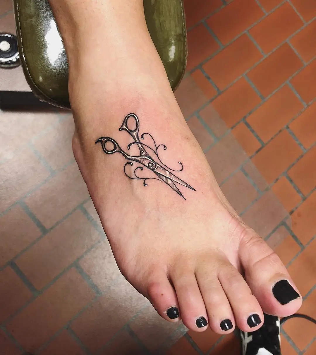 Elegant scissors inked on foot design