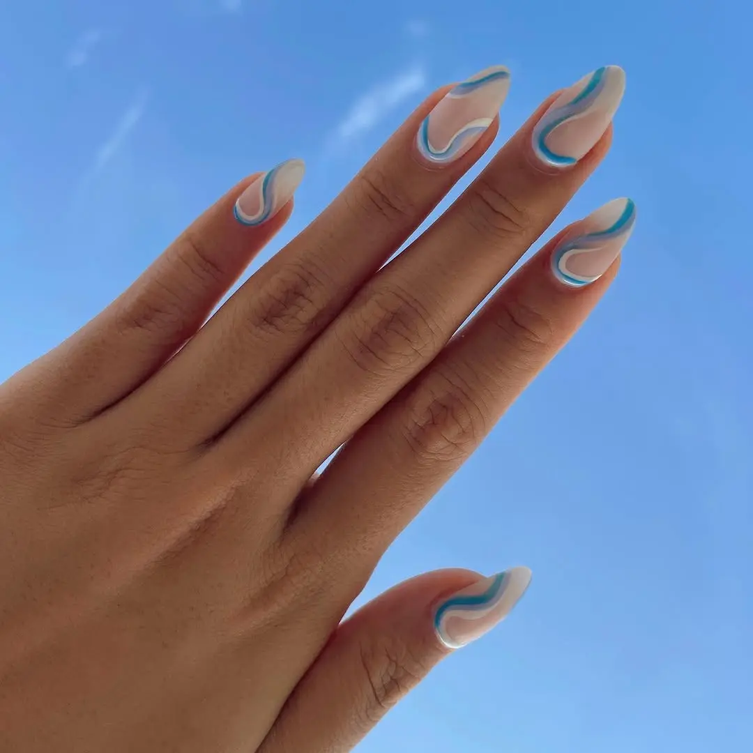 Stylish blue swirl vacation nail art design
