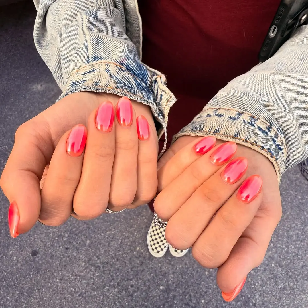 Vibrant pink nails perfect for summer outings