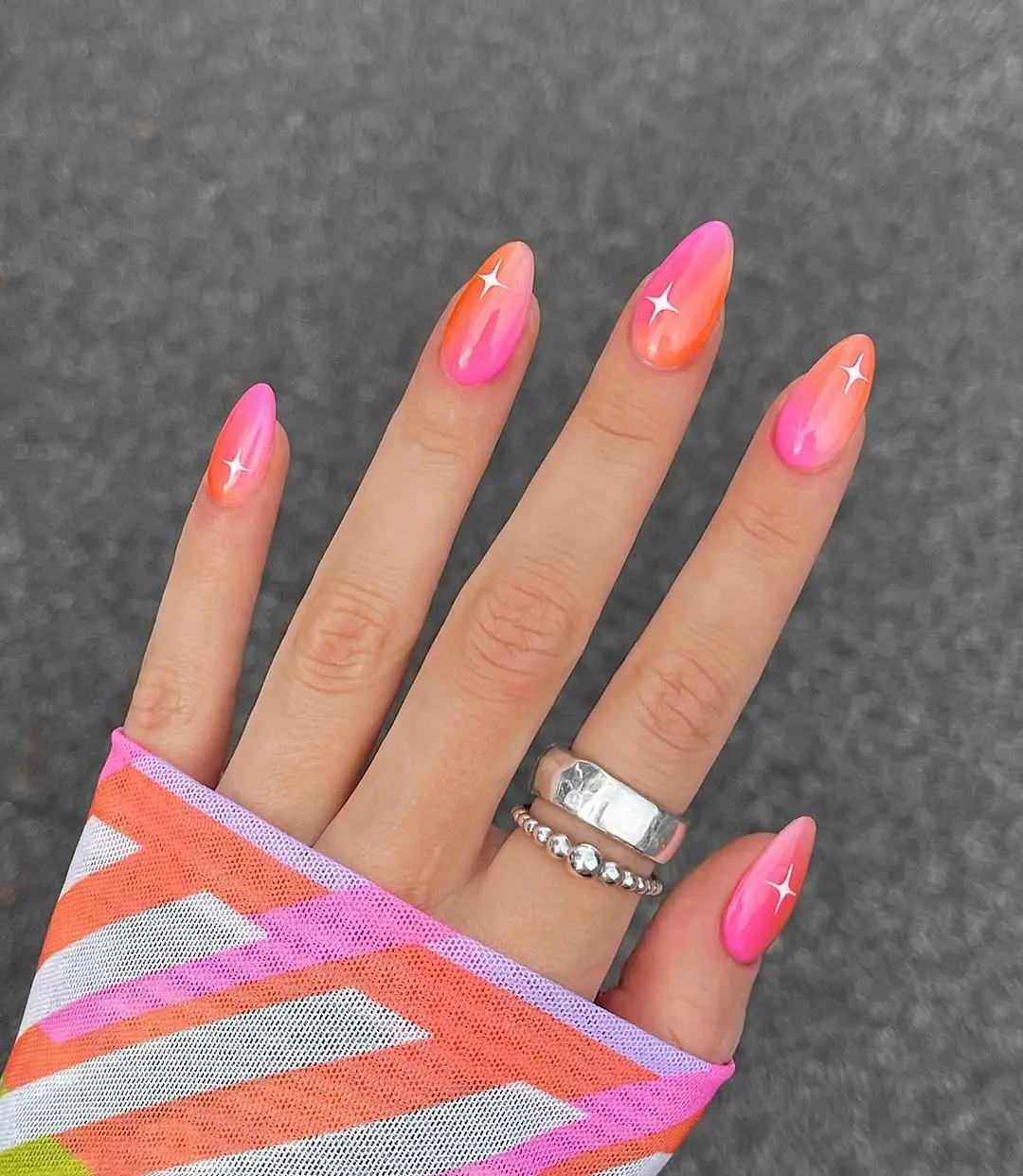 Vibrant pink gradient with shiny stars