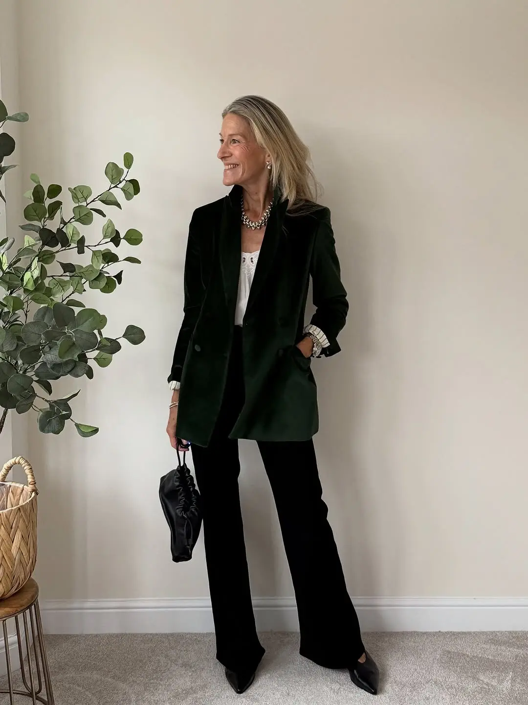 Chic green velvet blazer with sleek trousers