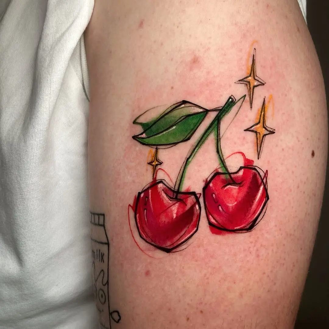 Playful cherry tattoo with a whimsical touch
