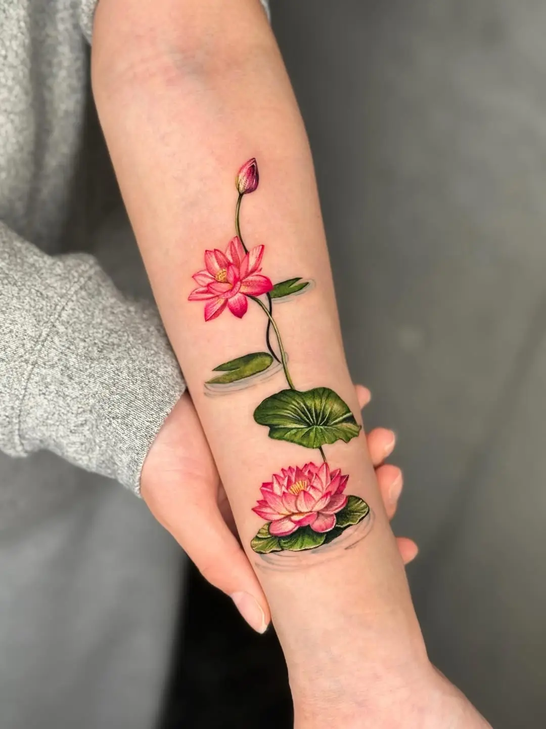 Vibrant water lily tattoo showcasing nature's beauty