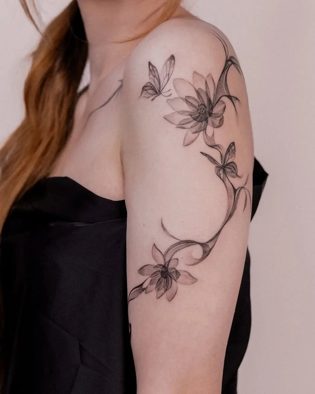 Delicate water lily tattoo showcasing graceful elegance