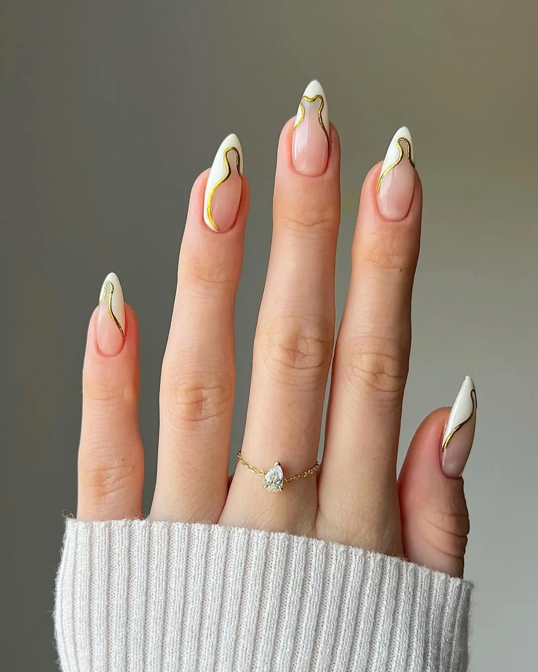 Elegant wedding nails with gold accents