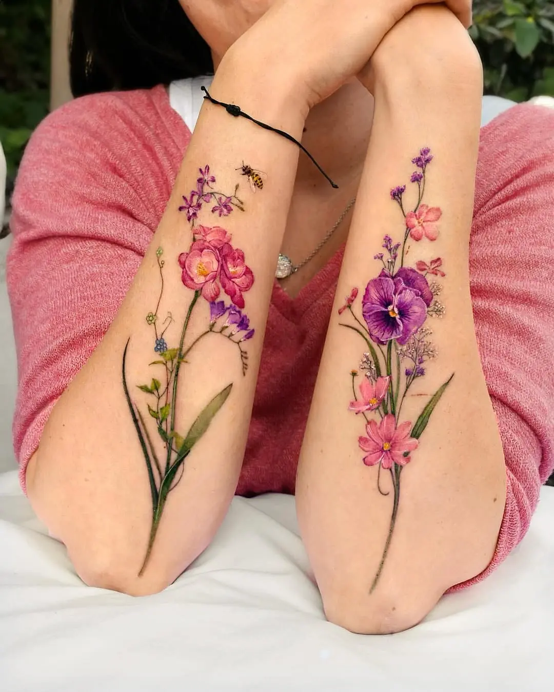 Stunning floral tattoo art on forearms