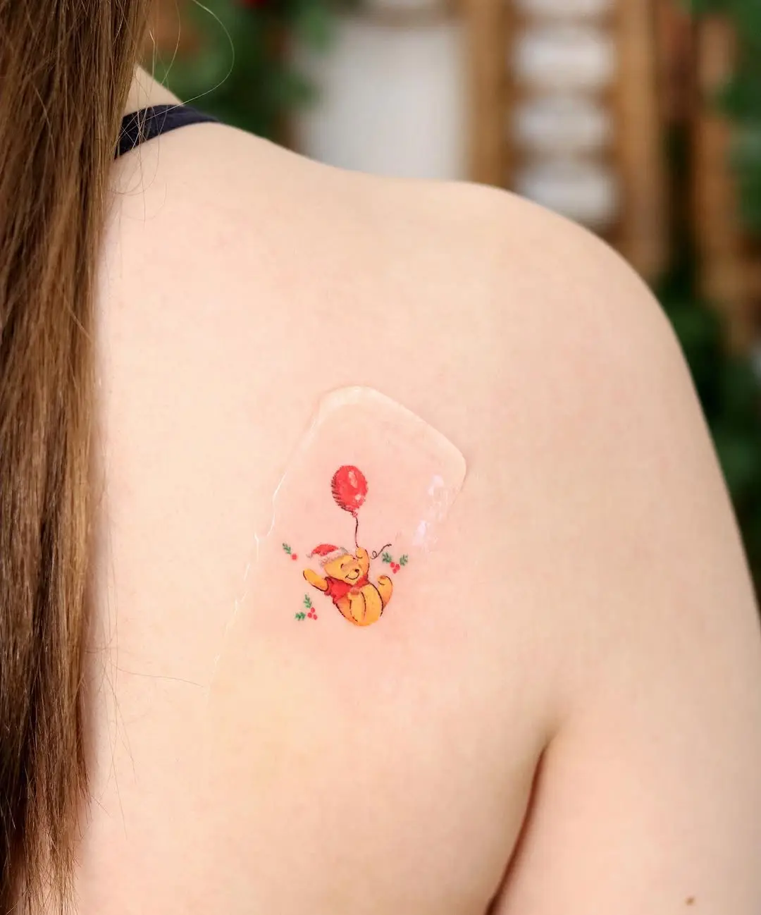 Cute Pooh Bear with Balloon Tattoo