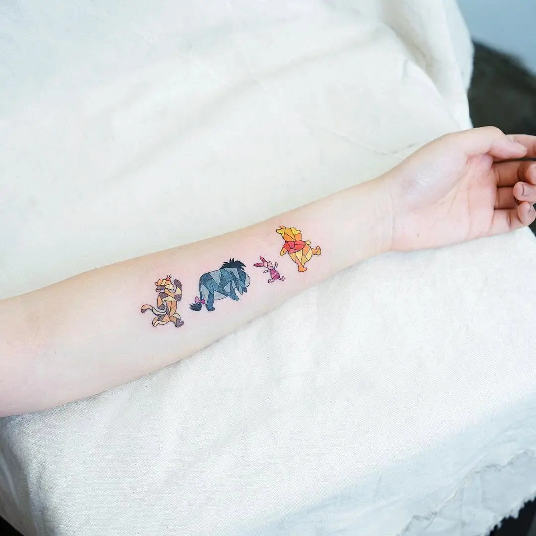 Charming Winnie the Pooh Character Tattoo Design
