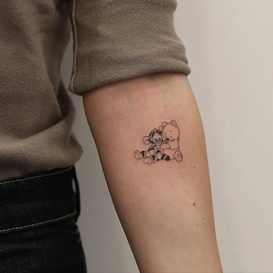 Charming Winnie the Pooh and Friends Tattoo Design
