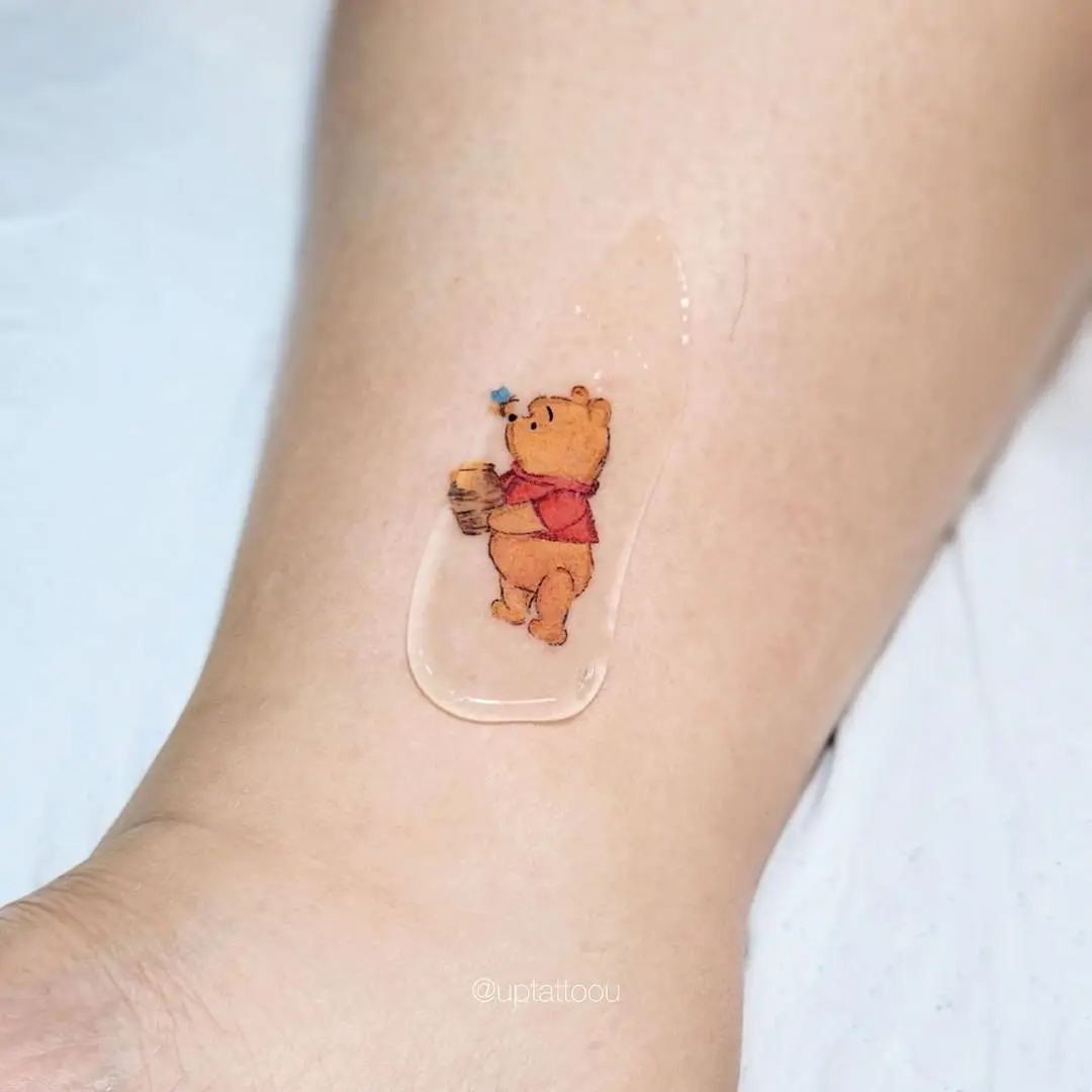 Charming Winnie the Pooh holding honey pot