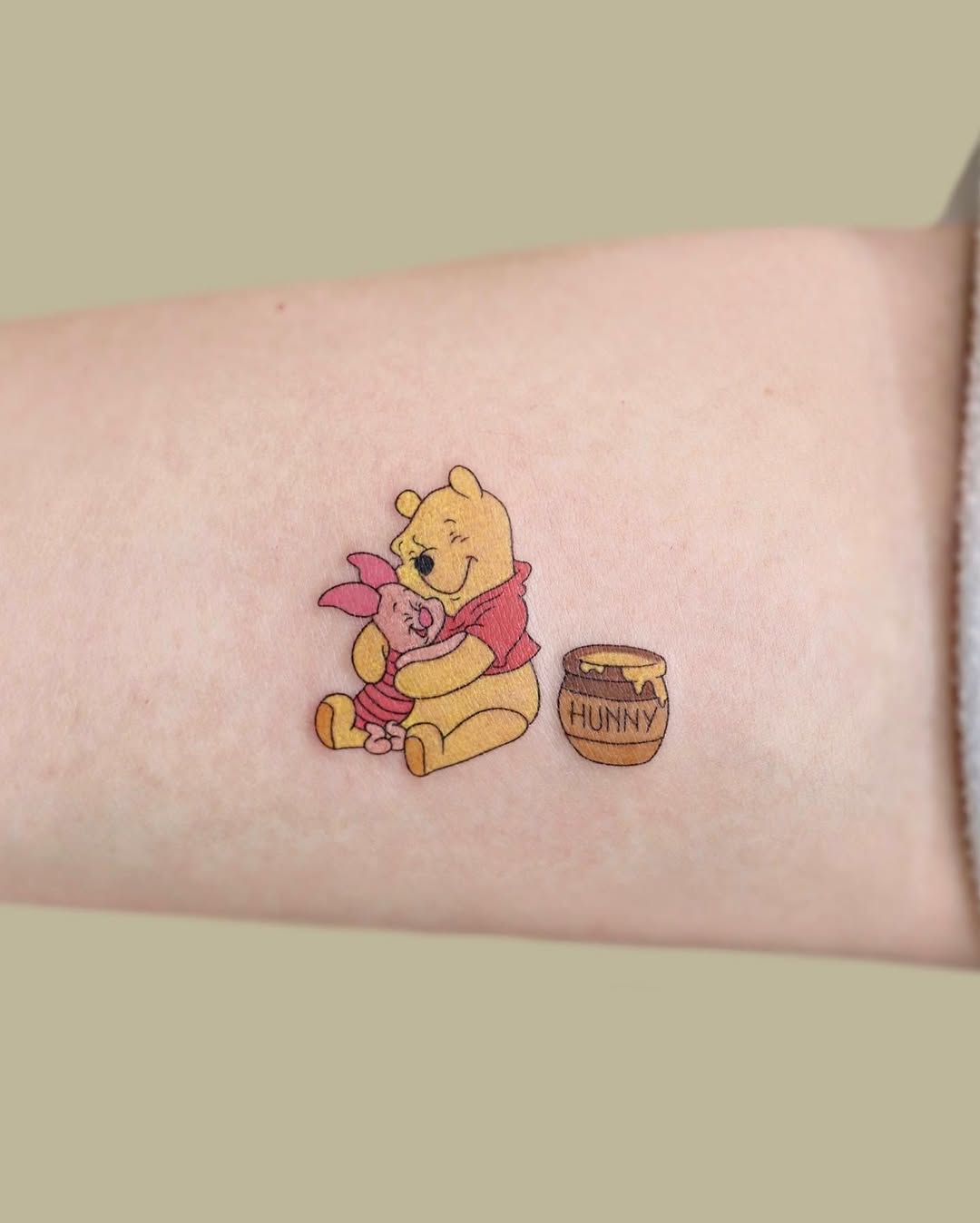 Winnie and Piglet in a sweet hug