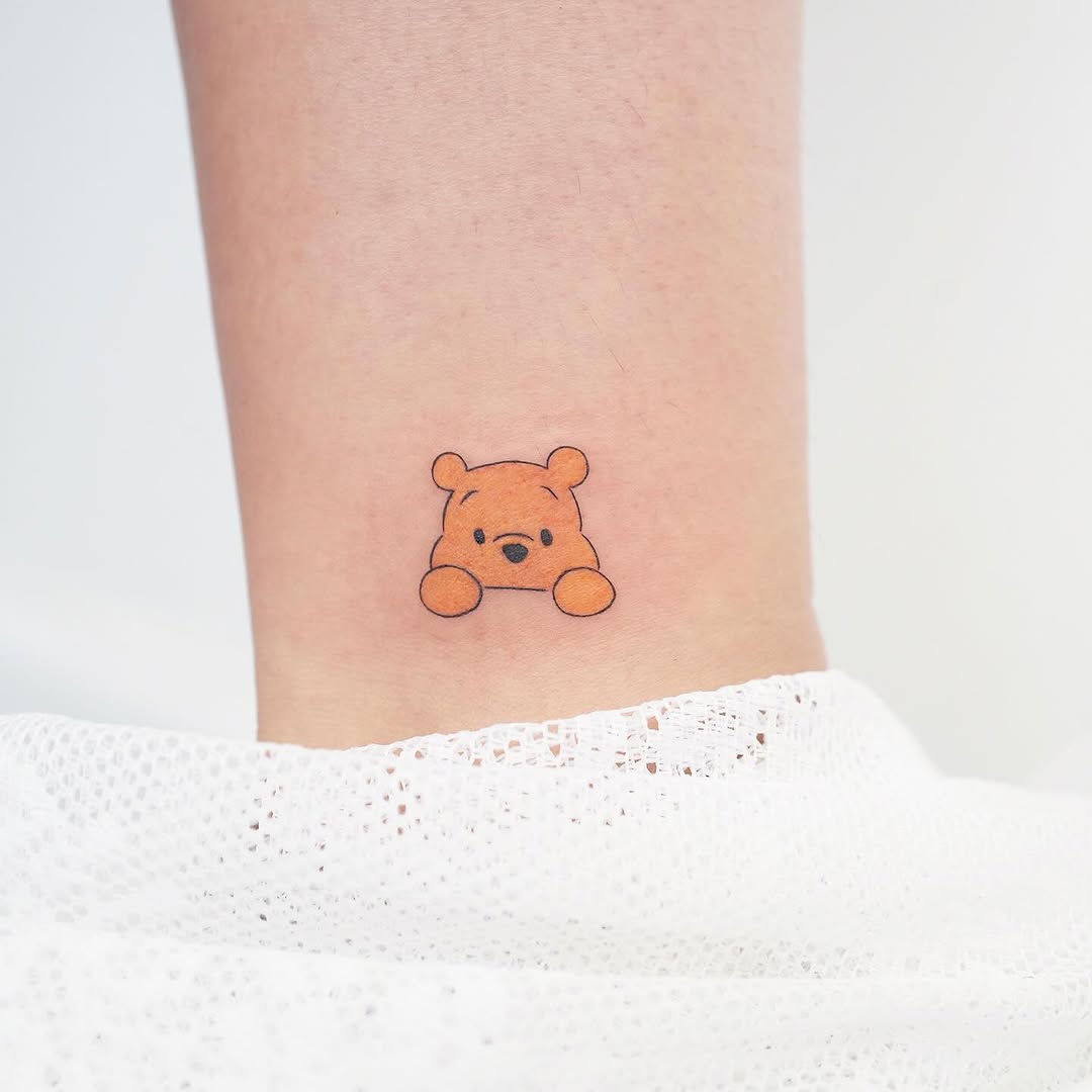 Adorable Winnie the Pooh Ankle Tattoo Design