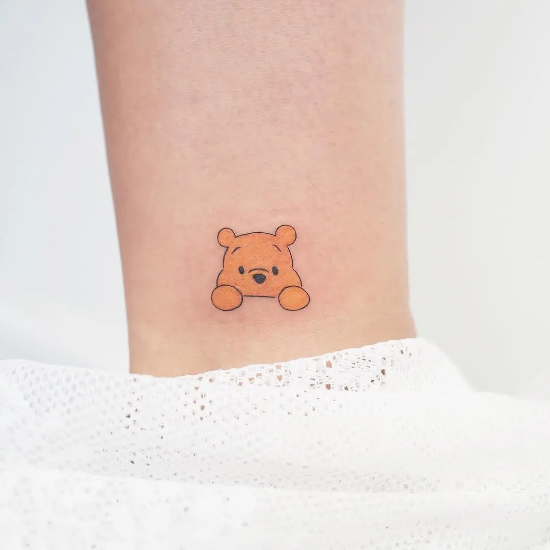 Adorable Winnie the Pooh Ankle Tattoo Design