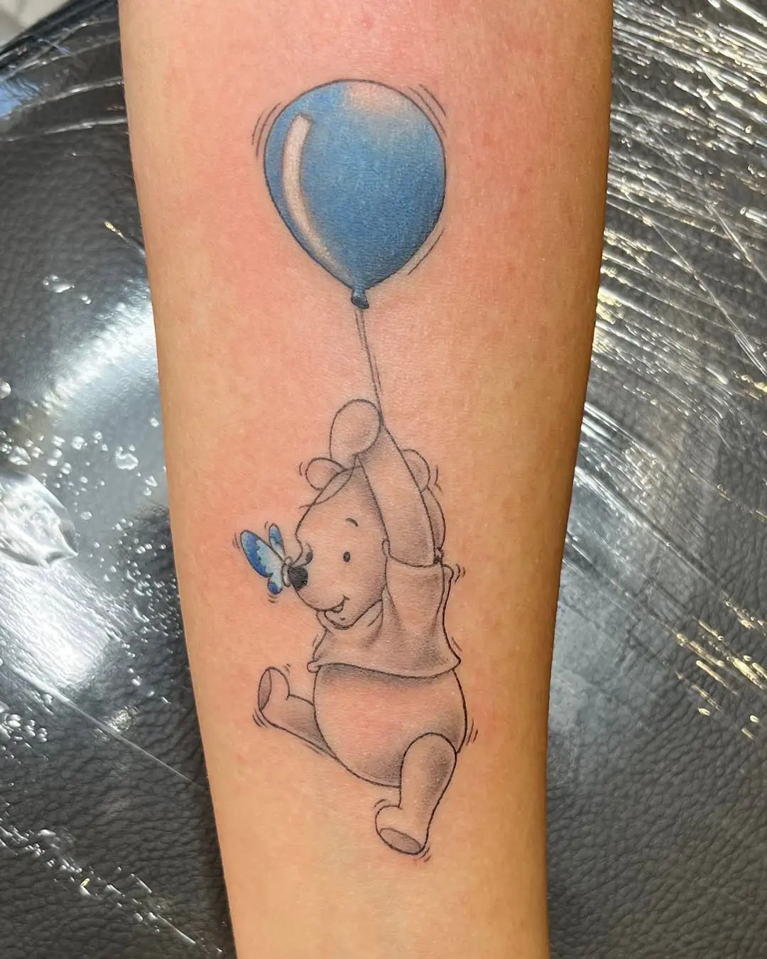 Whimsical Winnie the Pooh with Balloon Tattoo
