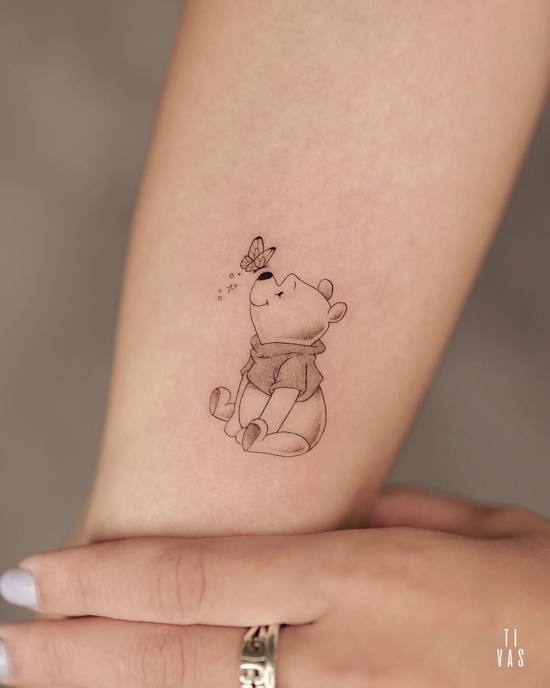 Charming Pooh Under a Butterfly's Spell