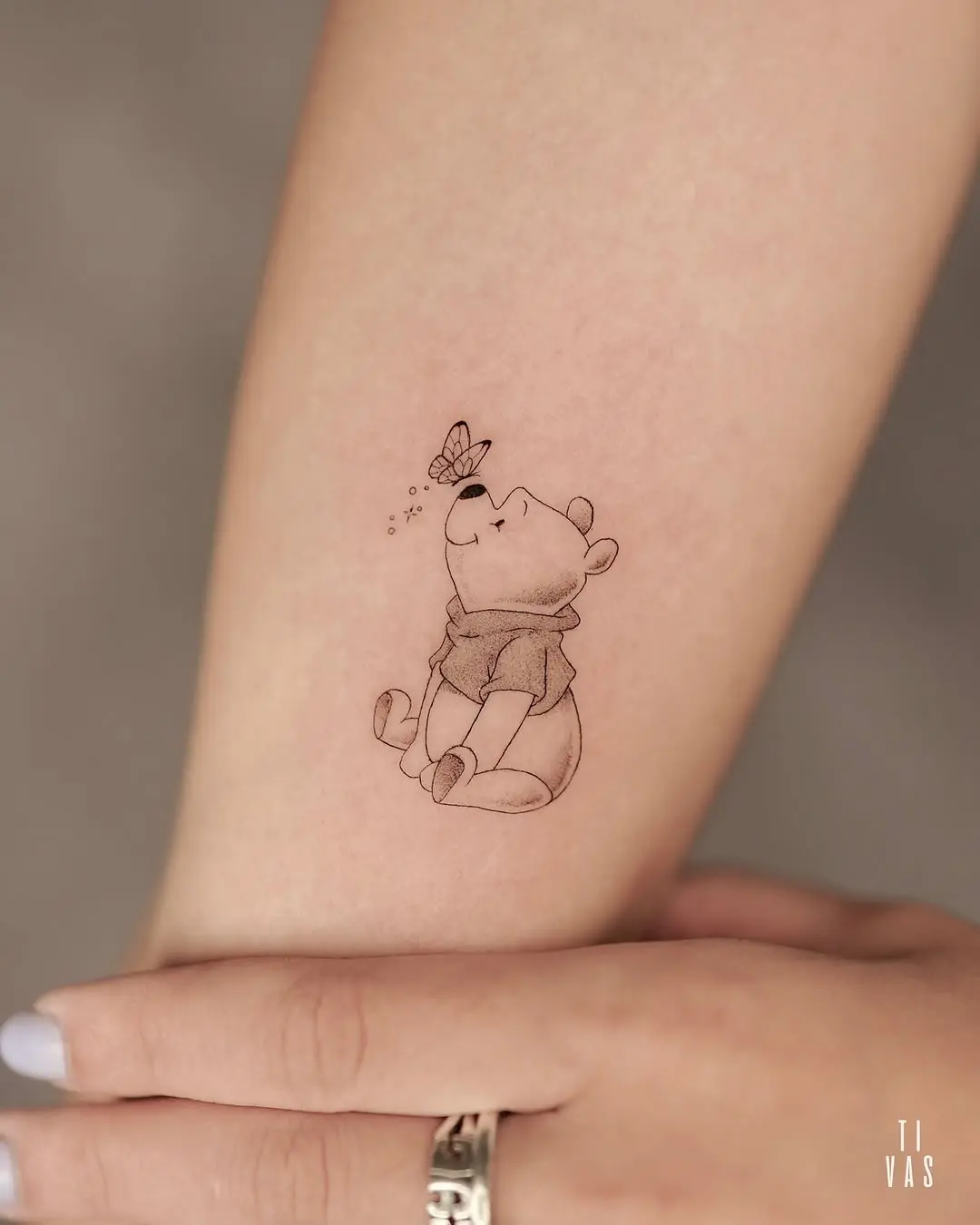 Charming Pooh Under a Butterfly's Spell