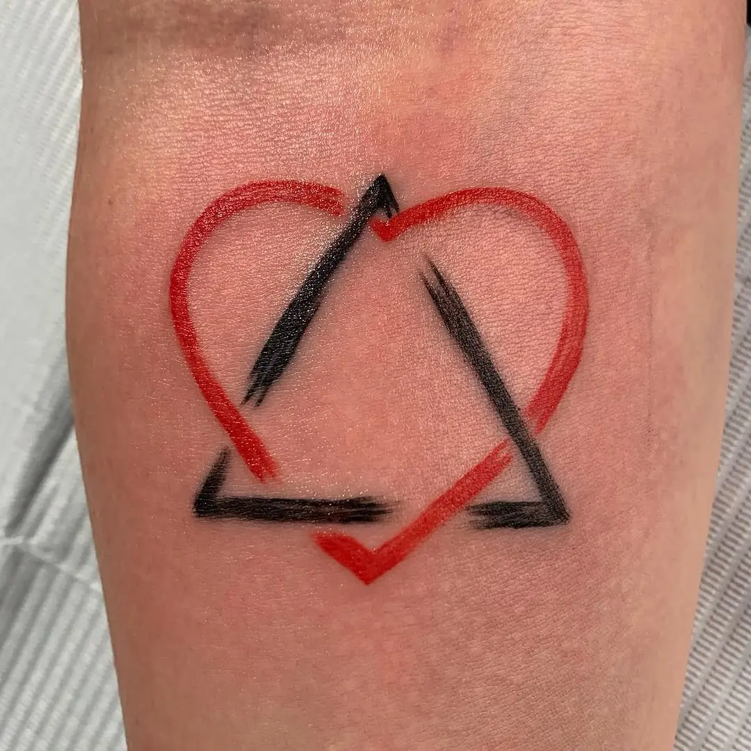 Unique heart and triangle tattoo design