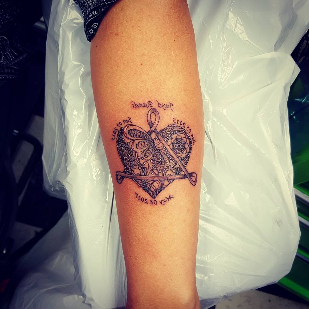 Melodic infinity symbol adoption tribute tattoo