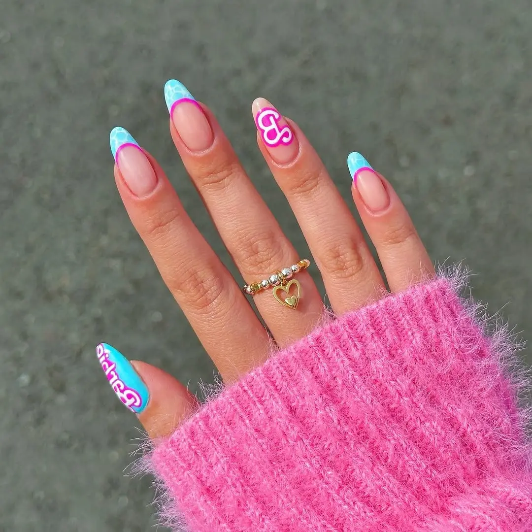 Colorful Barbie-inspired nails with playful designs