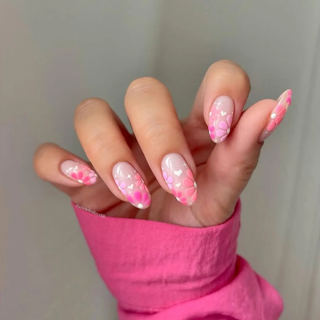 Charming pink floral nail art with hearts