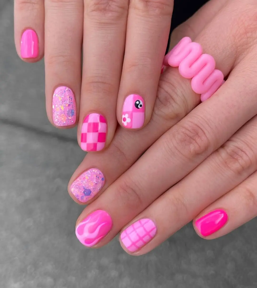 Colorful Barbie-inspired nails with cute designs