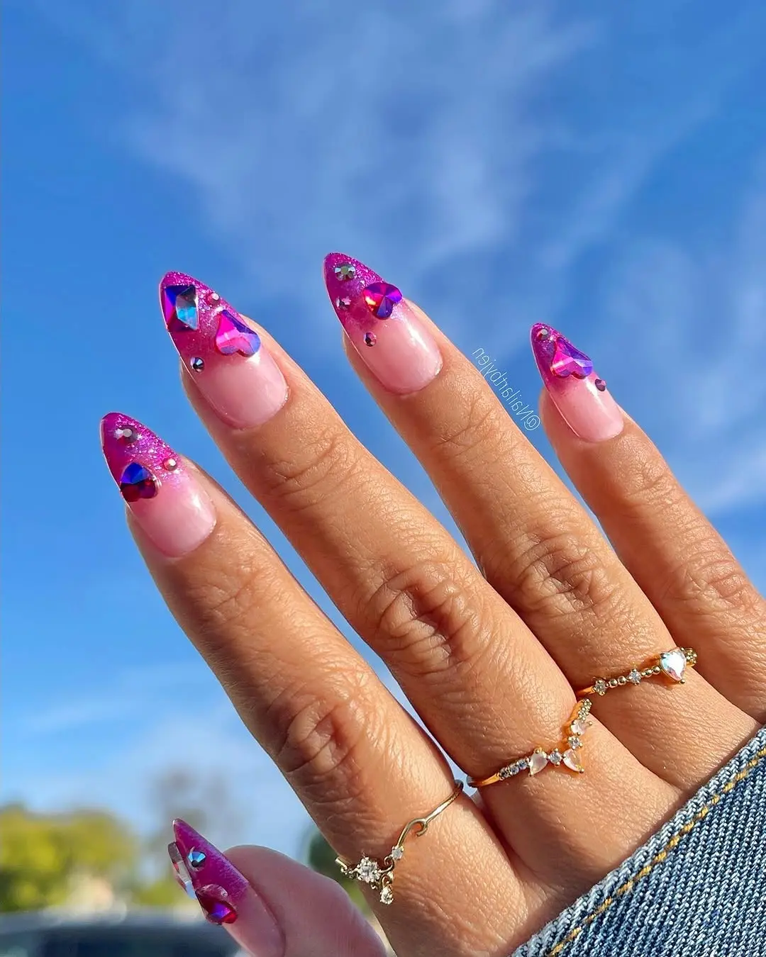 Vibrant pink hearts and glittery tips