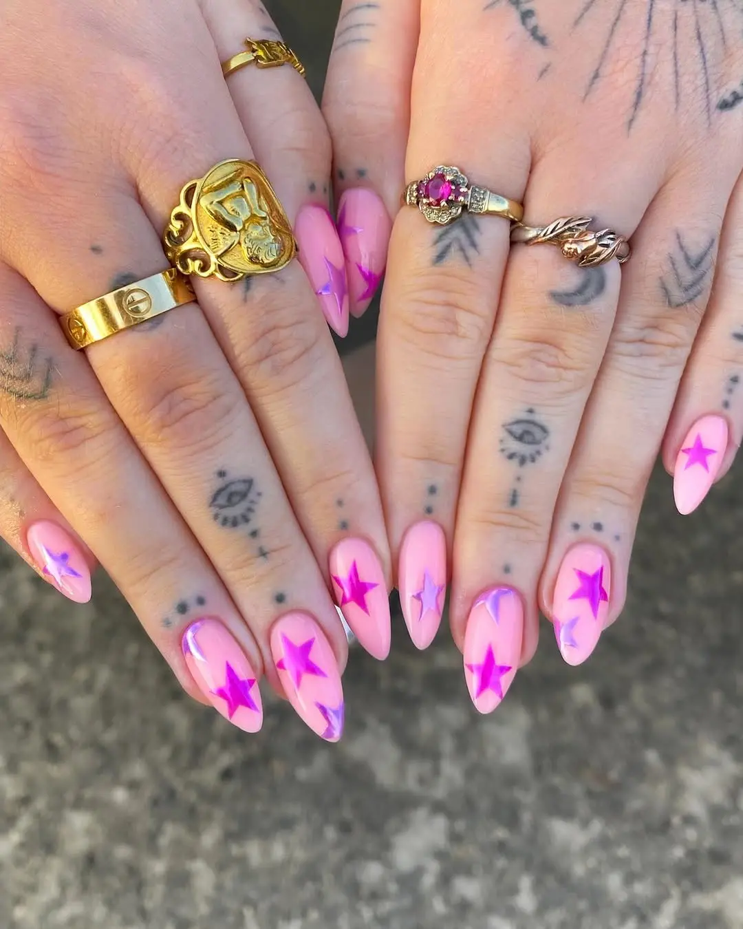 Chic Barbie Nails with Vibrant Star Accents