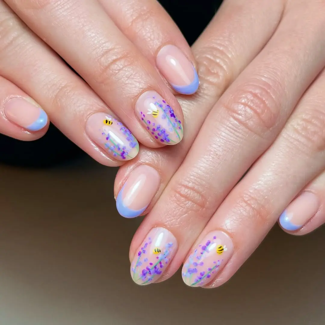 Charming bee nails with floral accents