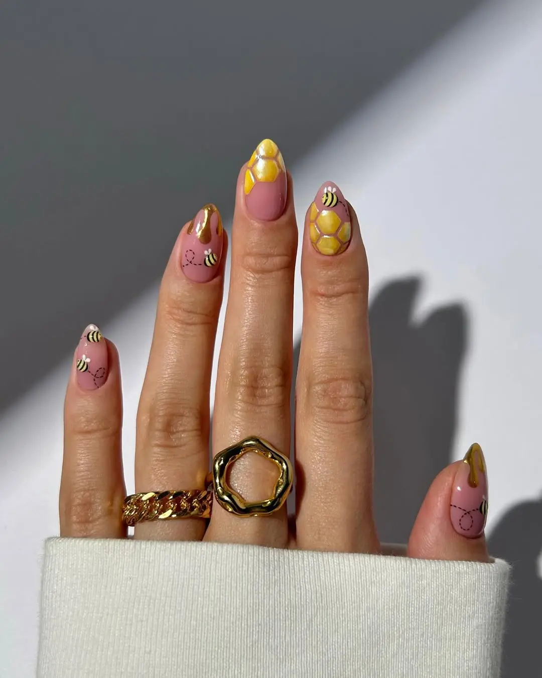Charming bee-themed nail art for nature lovers