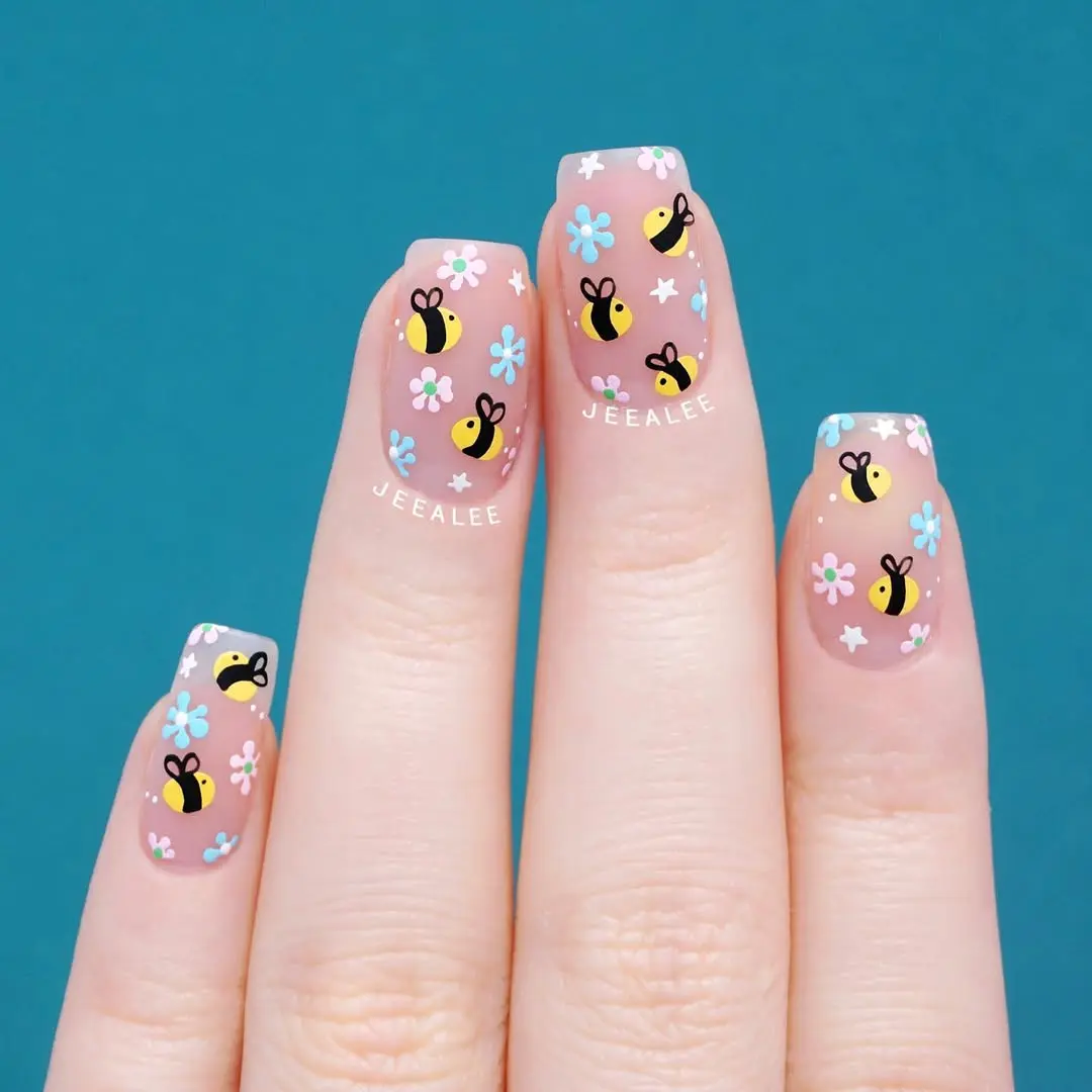 Charming pastel bee nail art design
