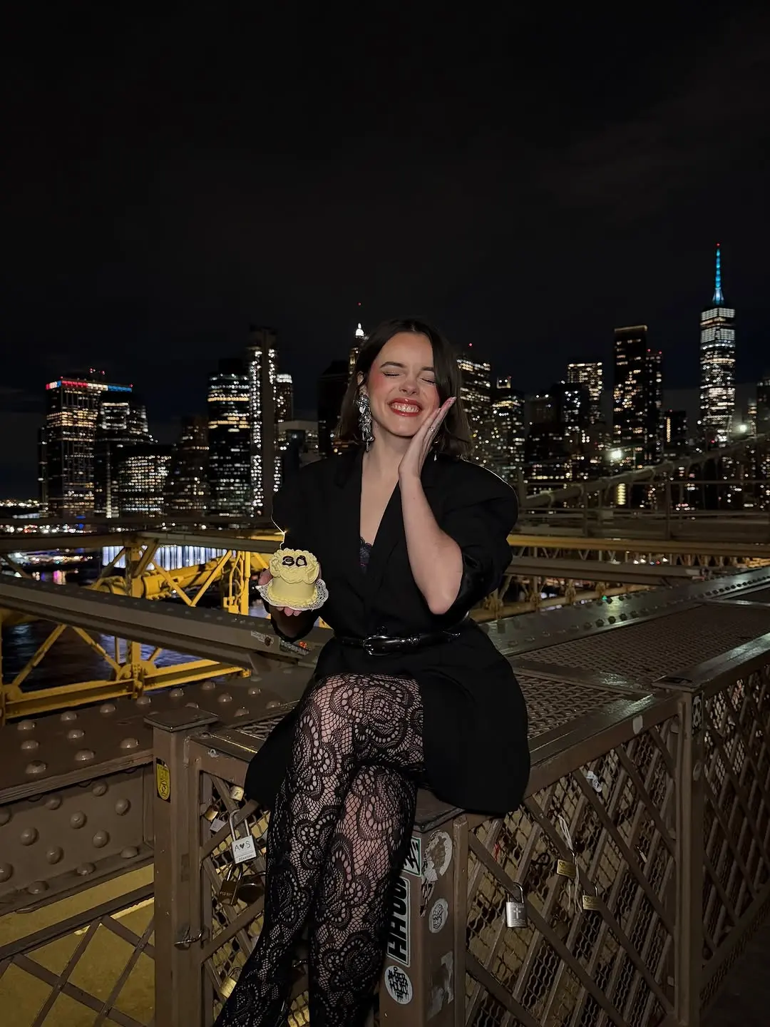 Chic birthday outfit against a vibrant skyline