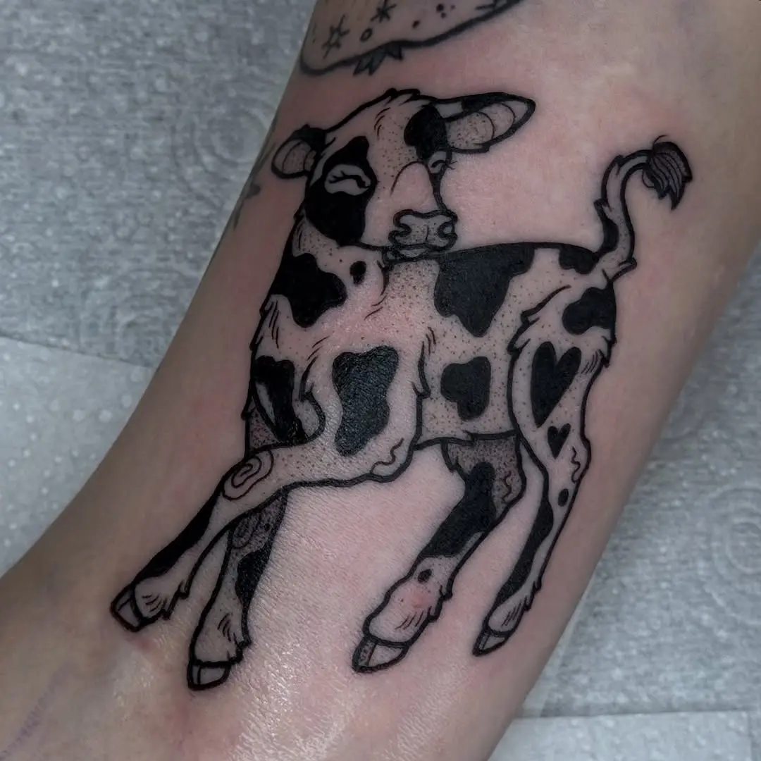 Playful calf tattoo with unique heart pattern