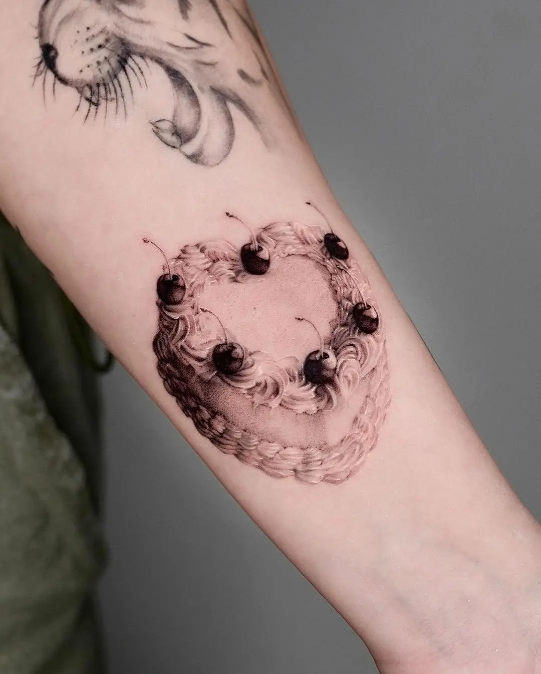 Charming Heart-Shaped Cake Tattoo with Cherries
