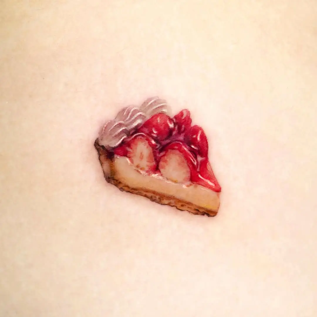 Deliciously detailed strawberry pie tattoo design