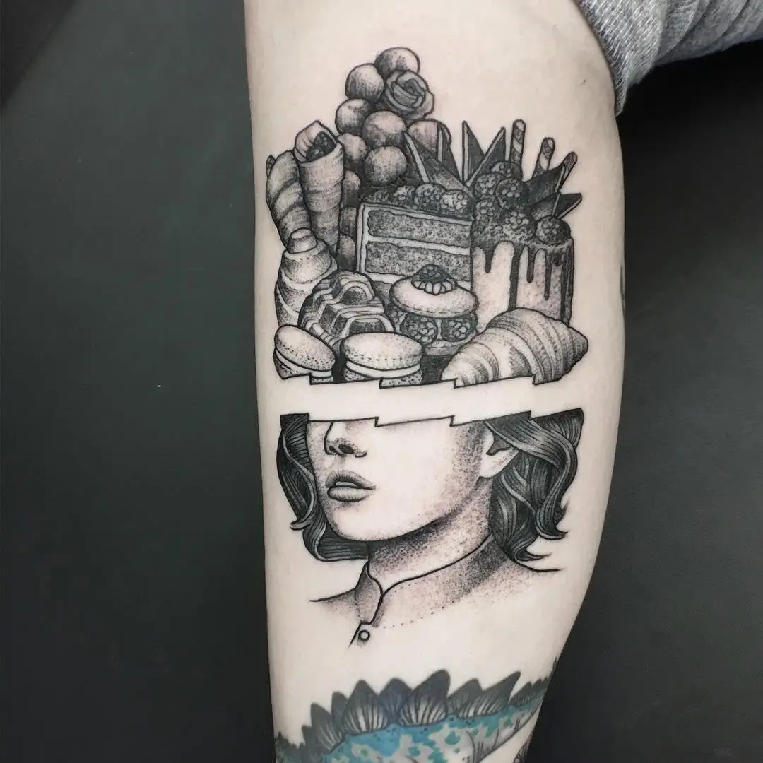 Intricate cake tattoo with a hidden portrait