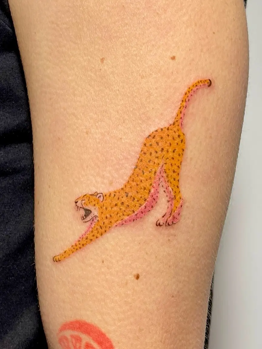 Striking Cheetah Tattoo in Bold Style