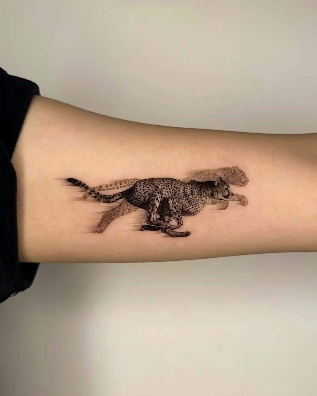 Stylish Cheetah Tattoo in Motion