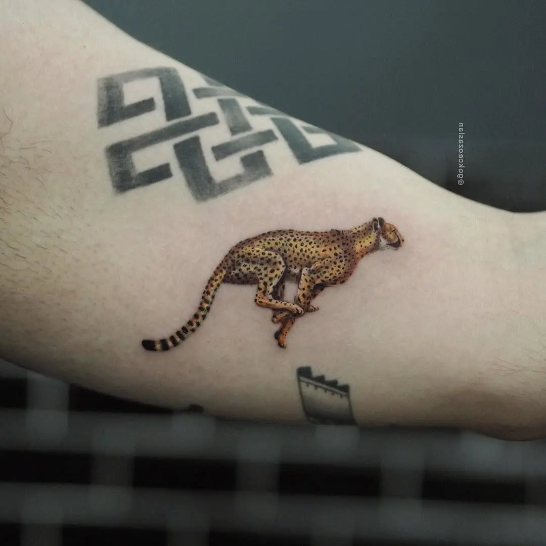 Vibrant Cheetah Tattoo in Motion