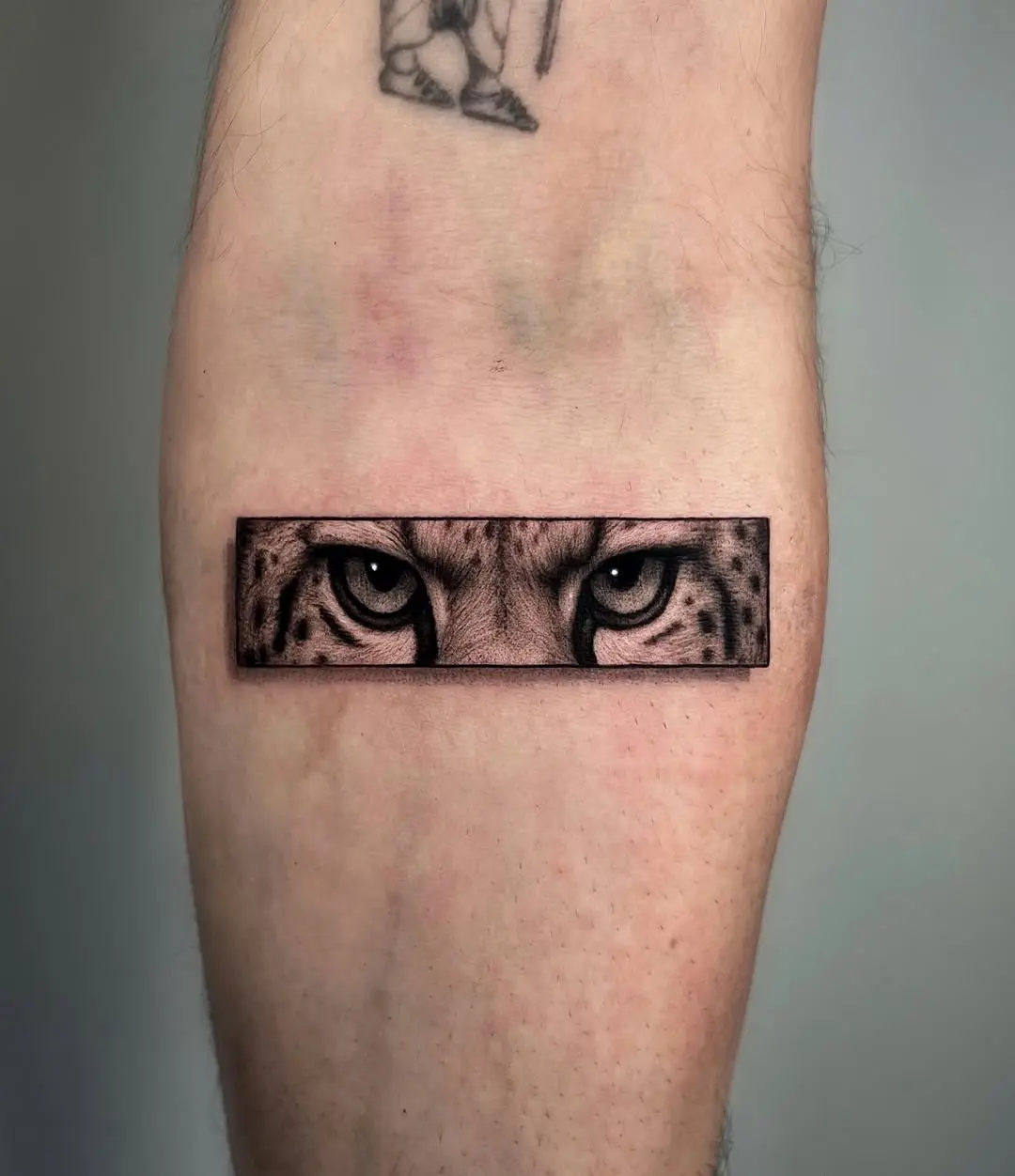 Intense Cheetah Eyes Tattoo Design