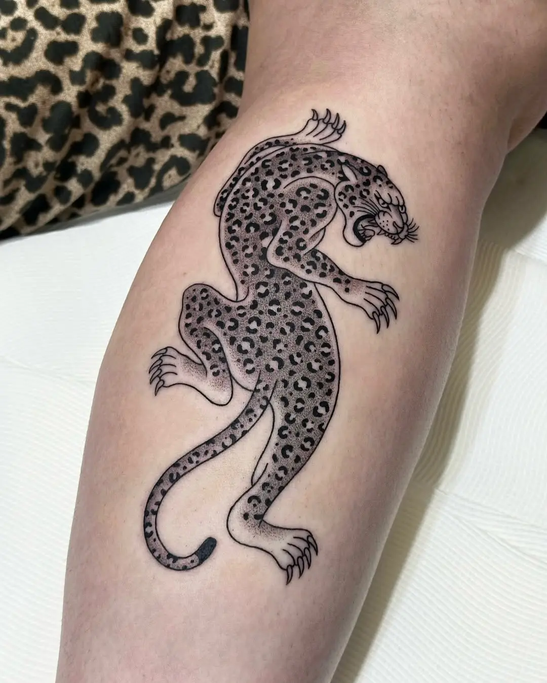 Bold Cheetah Tattoo with Unique Detailing