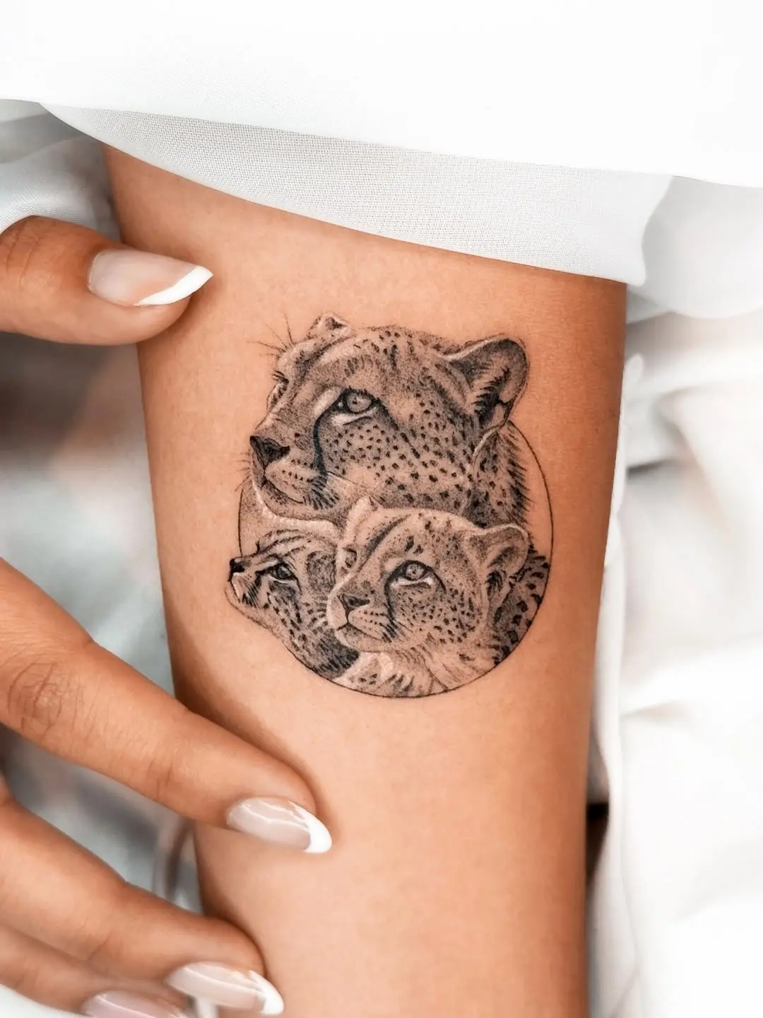 Intricate depiction of multiple cheetah faces
