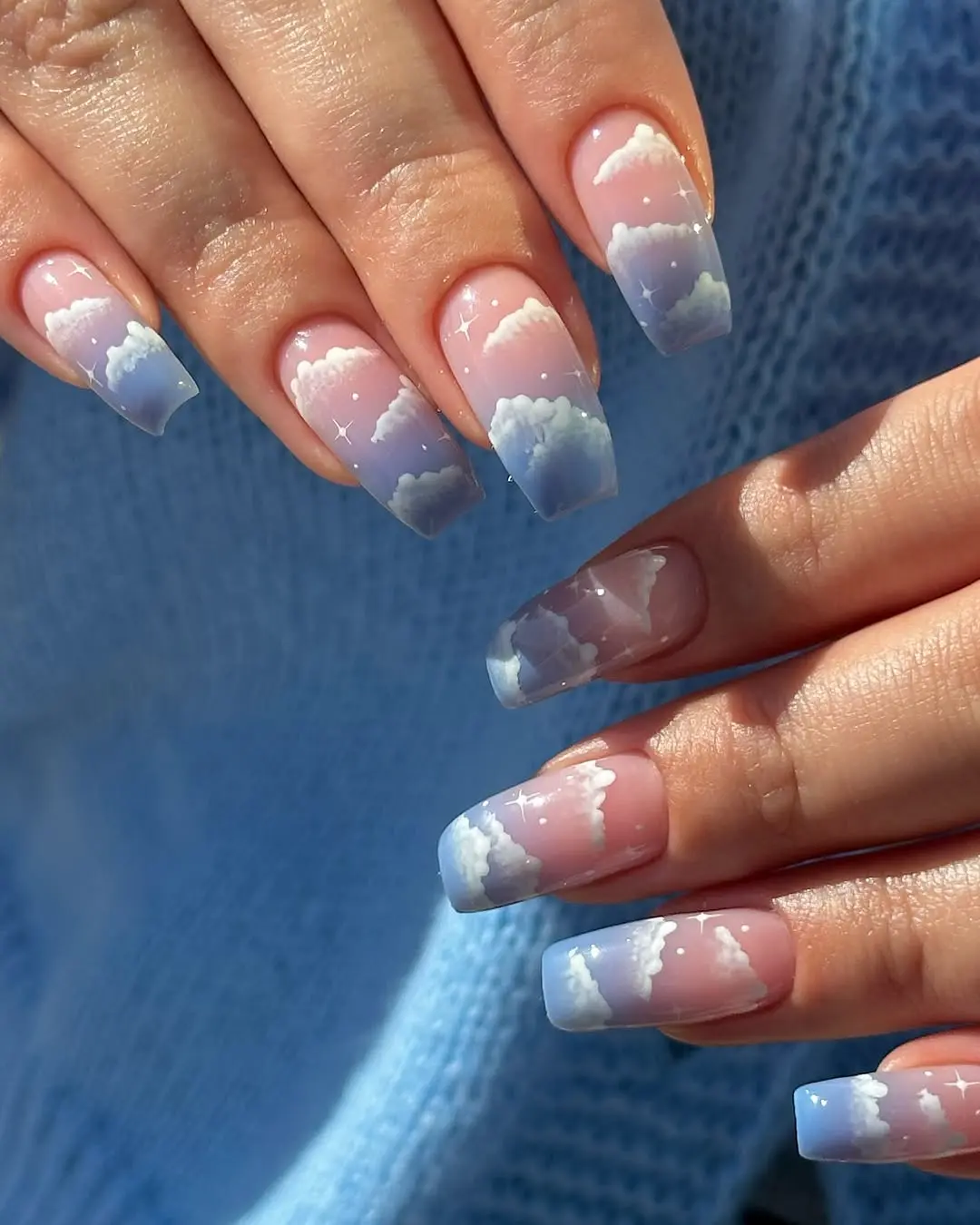Whimsical cloud-inspired nail art design