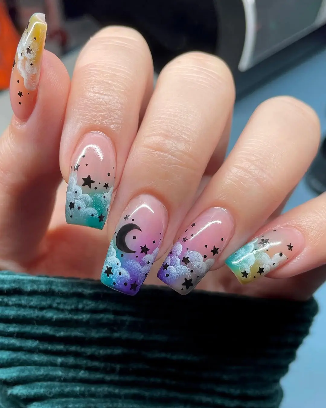 Dreamy cloud nails with celestial accents