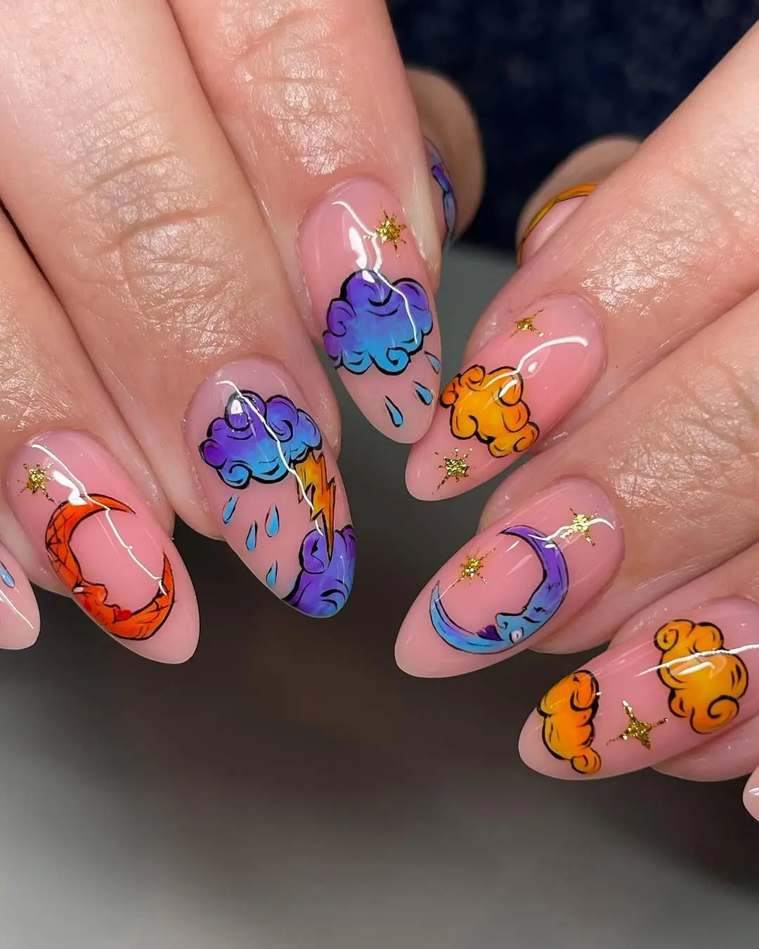 Vibrant cloud-inspired nail art design