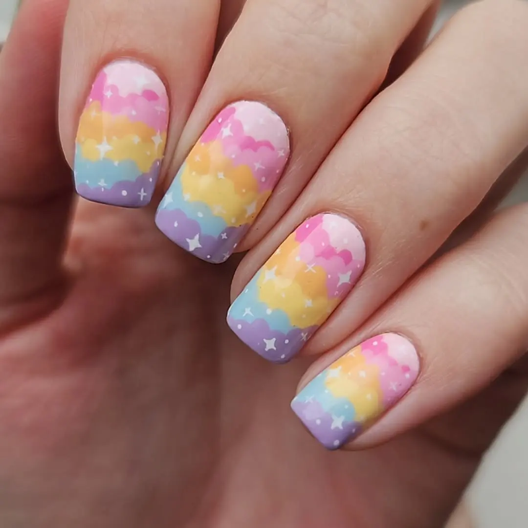 Vibrant cloud nails with pastel hues